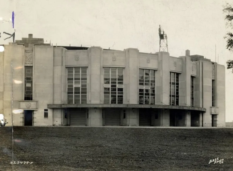 A historic photo showing Perry (Bush) Stadium’s Entrance, a three-story semicircular limestone facade with tall windows